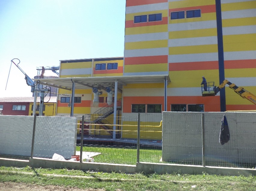 Construirea morii de grâu și silozuri pentru cereale